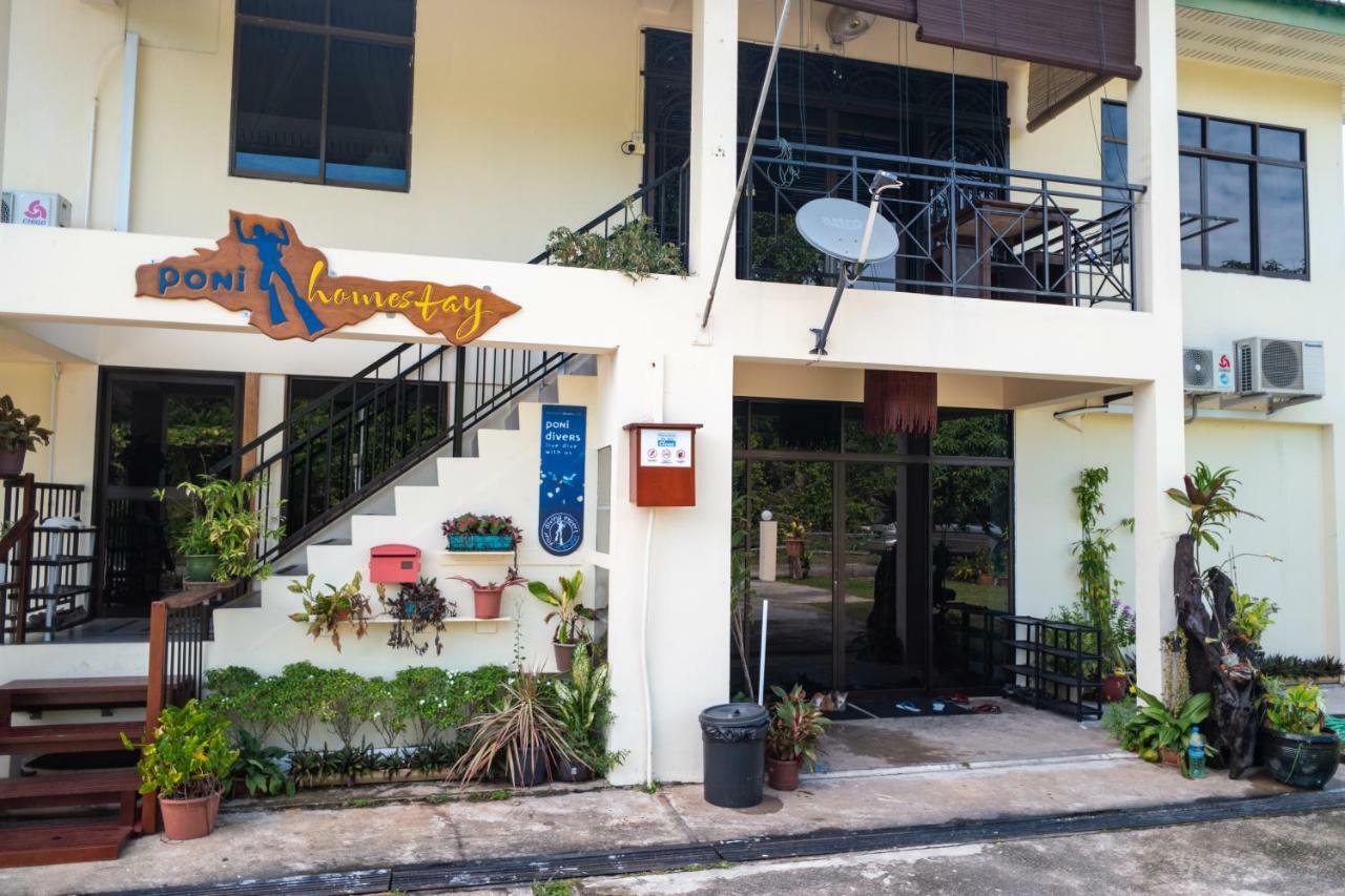 Poni Homestay Muara Buitenkant foto