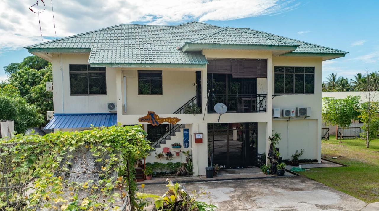 Poni Homestay Muara Buitenkant foto